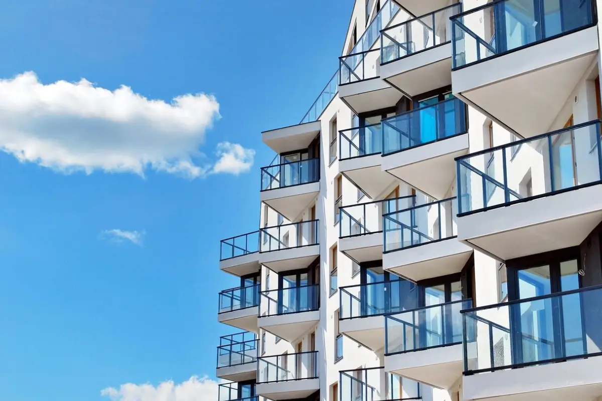 A building with many balconies and windows on it